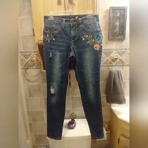 Flower Embroidered mid-rise jeans size 4